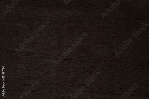 Brown color of old wood and crack on the surface for background and texture