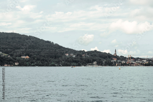 View of the mountains and lake Annecy in Haute-Savoie in France in cloudy weather in summer. Water landscape. 