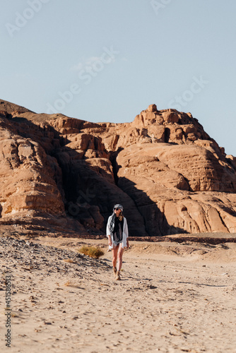 A woman in a desert