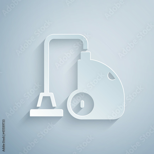 Paper cut Vacuum cleaner icon isolated on grey background. Paper art style. Vector