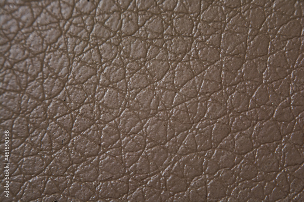 Beige leather on the chair (macro, texture, background) Beige leather on the chair (macro, texture, background)
