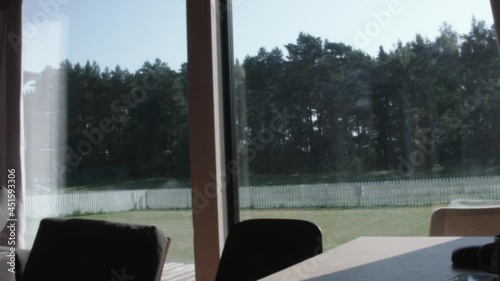 curtains on a window in a room full of sunlight
