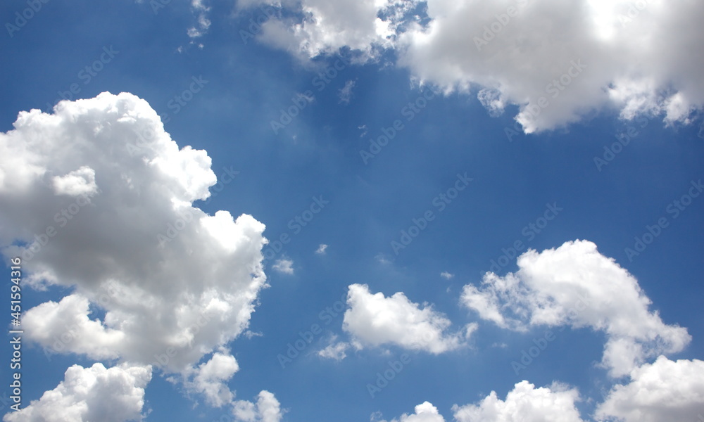 Obraz premium thick white clouds in the blue sky