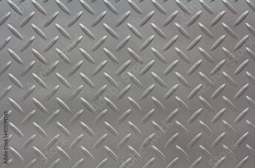 Silver painted metallic plate anti slip surface. Metal diamond plate texture. © niwat
