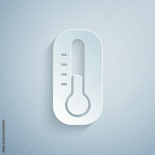 Paper cut Meteorology thermometer measuring icon isolated on grey background. Thermometer equipment showing hot or cold weather. Paper art style. Vector