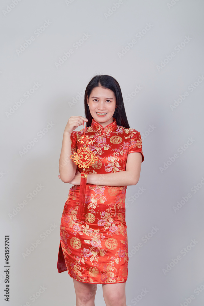 Beautiful young asian woman wearing wear chinese dress Beautiful young asian woman wearing wear chinese dress