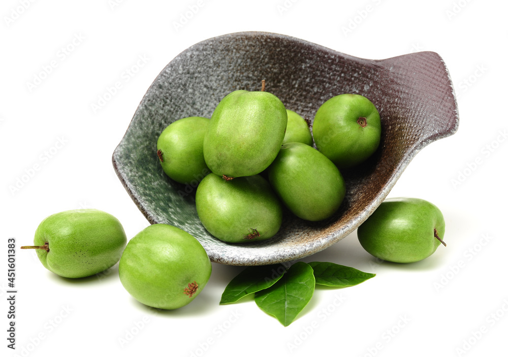mini kiwi baby fruit (actinidia arguta) on white background mini kiwi baby fruit (actinidia arguta) on white background