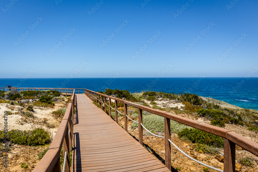 Wooden walkways by the Atlantic Ocean in Zambujeira Do Mar, Alentejo, Portugal
