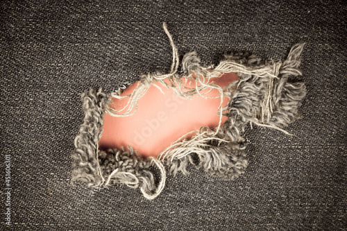 Torn denim vintage texture background.