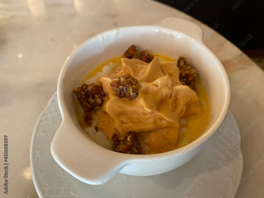 Caramel Mousse with Nougat, Rice, Cream and Lemon Peel also Called Riz Au Lait. Caramel Mousse with Nougat, Rice, Cream and Lemon Peel also Called Riz Au Lait.