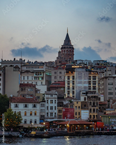 View of old city over the Golden Horn with Galat Towe on top at night Istanbul, Turkey