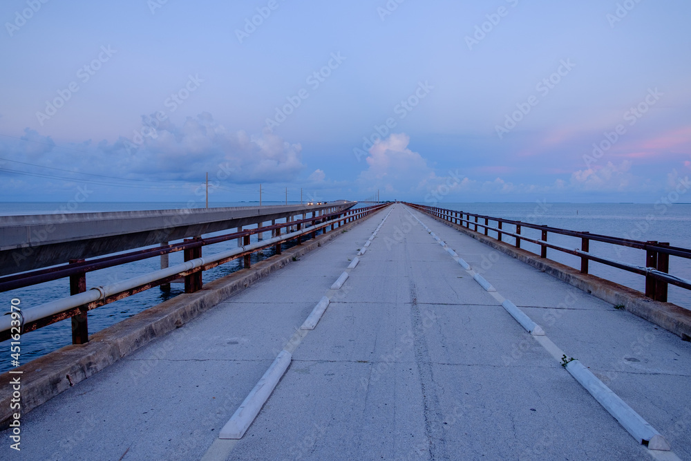 View of the old and closed seven mile bridge in the Florida Keys at dawn