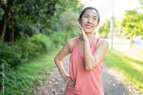 Asian women exercise at the park, use the equipment to exercise and stay fit, healthy and in good shape.