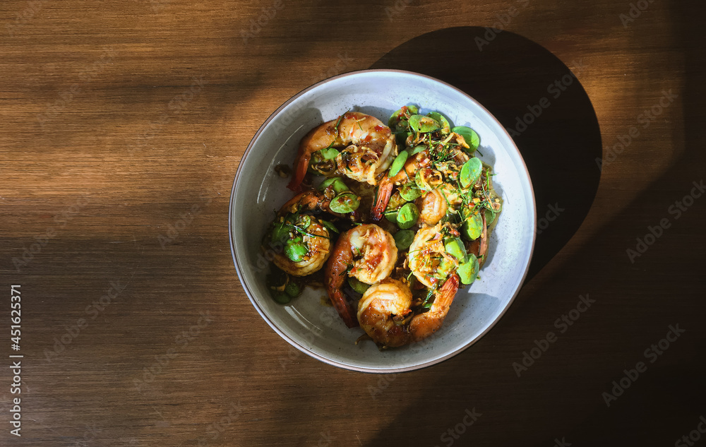 Thai food, Stir-Fried Twisted Cluster Bean with Shrimp or Stir Fried Sator beans with Shrimp Thai food, Stir-Fried Twisted Cluster Bean with Shrimp or Stir Fried Sator beans with Shrimp