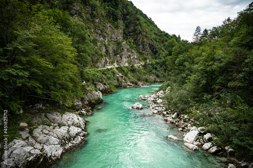 Blue Soča river with crystal clear water in the Soča valley (Slovenia)