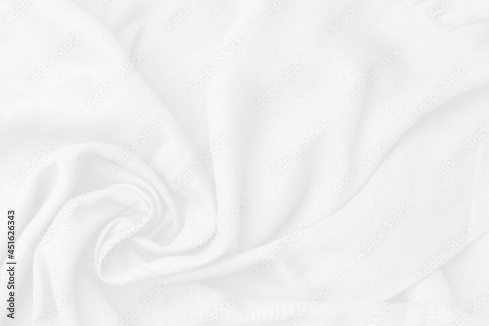 Abstract fabric texture looks luxurious background. The cotton white fabric has a soft look that is like a wave suitable for background, backdrop.