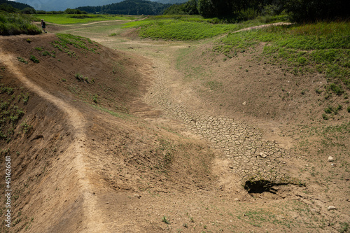 Sinkholes of drained Lake Cerknica (Cerkniško jezero) during the dry period in summer