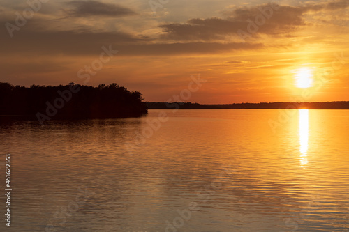 Lake Musov - South Moravia - Czech Republic. Calm water at sunset. Beautiful clouds in the sky.