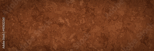 Abstract brown wall background. Weathered soil texture.