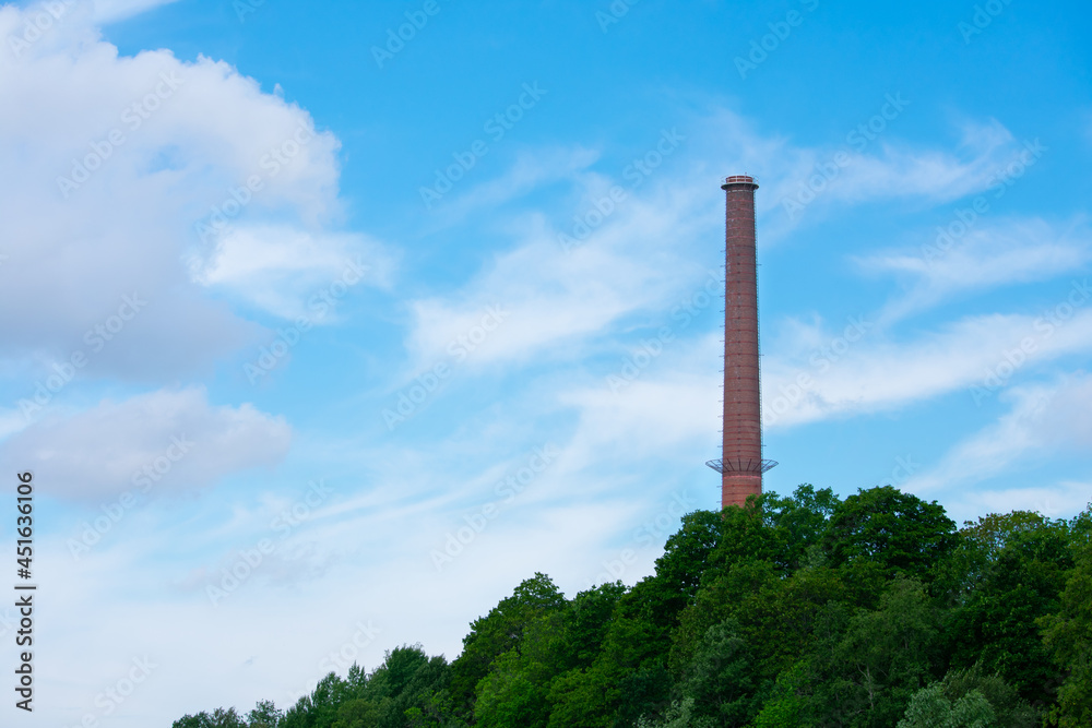 Smoke Pipe in the Forest on a Partly Cloudy Day