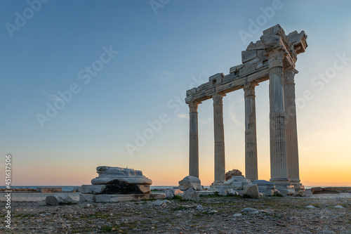Panoramic view of ruins of ancient Temple of Apollo in Side at sunrise, Alanya province, Turkey. Ruined old city. Unesco Cultural Heritage Monument.