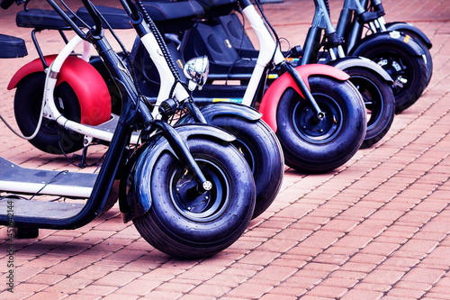 minibikes on the street. Personal transport. electric motorcycle. The concept transport with an electric motor of ecology and traffic safety in the city. photo