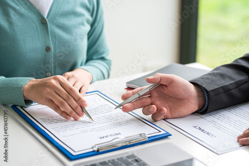 Fototapeta Naklejka Na Ścianę i Meble -  Businessman collaboration agreement resume employment contract documents at the office.