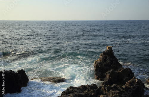 Cretan sea waves crashing against the rocks on Rethymno, Crete, Greece. High quality photo photo