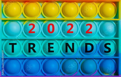 Trends planning 2022 new year symbol. Words  Trends 2022  on rainbow Pop It. Beautiful background  copy space. Business and Trends 2022 new year concept.