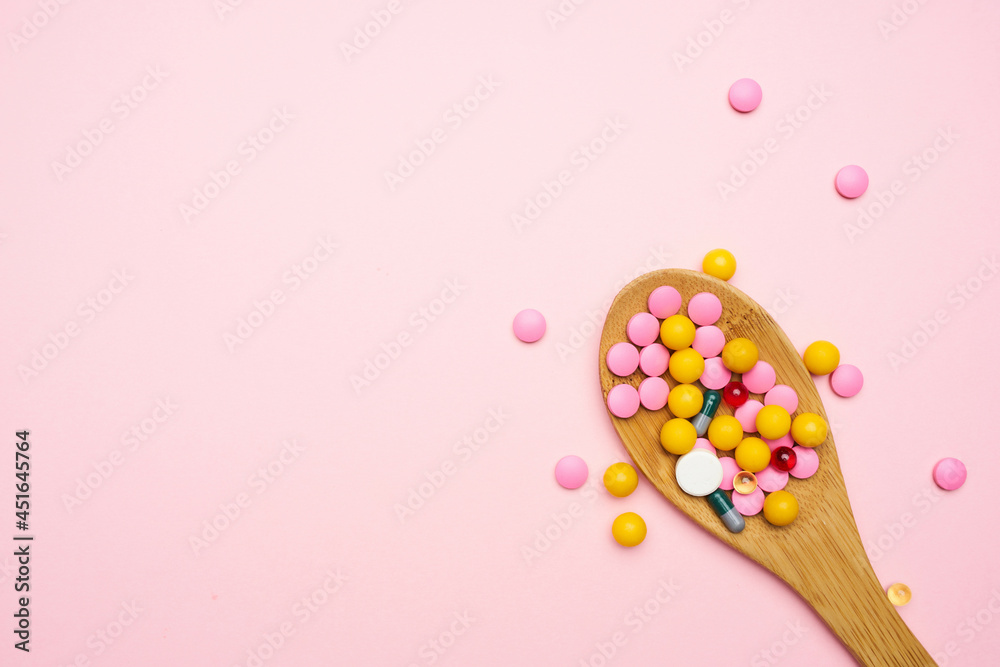 spoon with colorful pills top view medicine health care