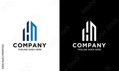 H N Initial logo concept with building template vector.