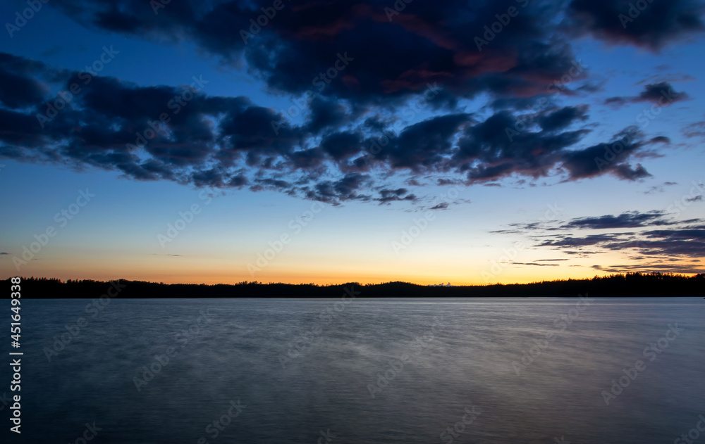 Midnight landscape on Swedish lake