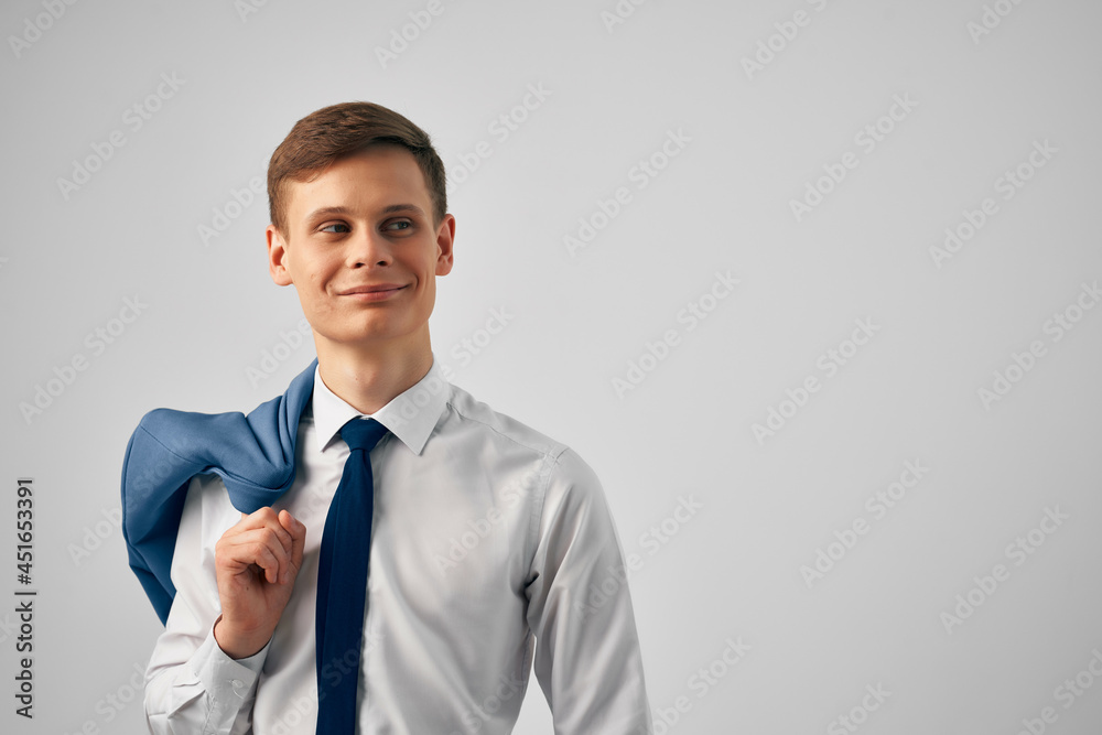man in shirt with tie and jacket on his shoulders fashion work man in shirt with tie and jacket on his shoulders fashion work