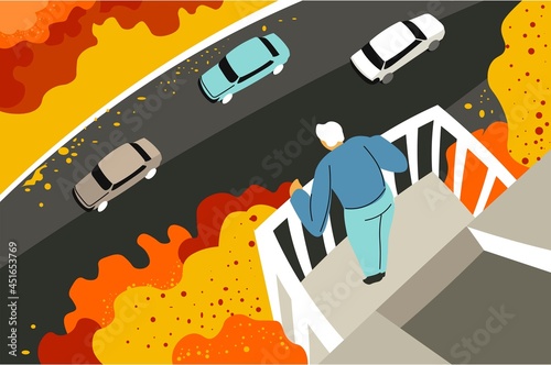 Man on balcony looking down at street with cars
