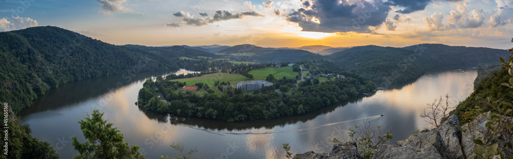 Vltava river horseshoe shape meander from Albert viewpoint close to Smilovice,Czech Republic.Beautiful landscape with river canyon at sunset.Panoramic view of Czech countryside with water reflection