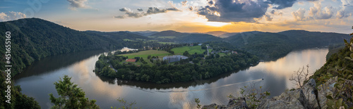 Vltava river horseshoe shape meander from Albert viewpoint close to Smilovice,Czech Republic.Beautiful landscape with river canyon at sunset.Panoramic view of Czech countryside with water reflection © Eva