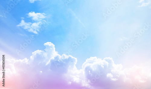 Colourful Sky with soft Clouds with pastel colour in blue, puple, pink, Yellow and Orange colour. Beautiful natural abstract multi colour fluffy clouds for website or banner background.