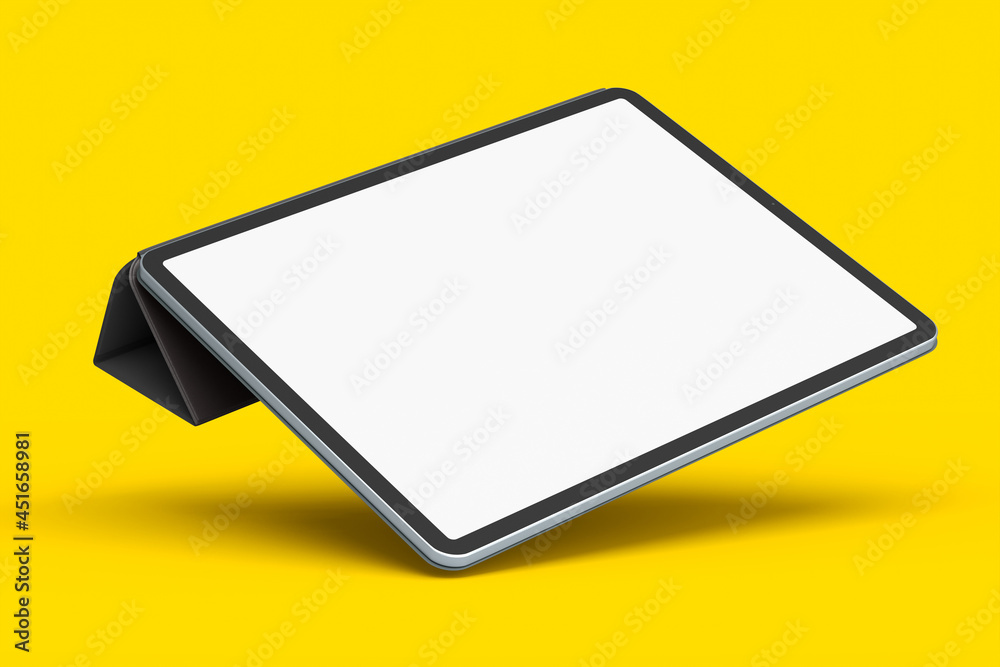 Computer tablet with cover case isolated on yellow background. Computer tablet with cover case isolated on yellow background.