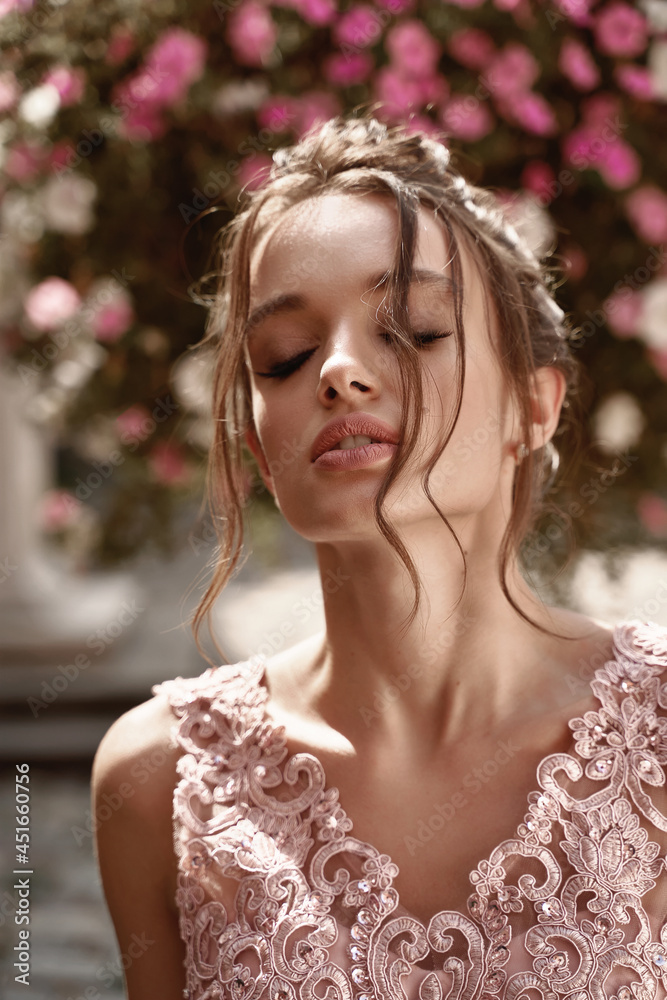Closeup portrait of beauiful European girls bridesmaid in pink dress