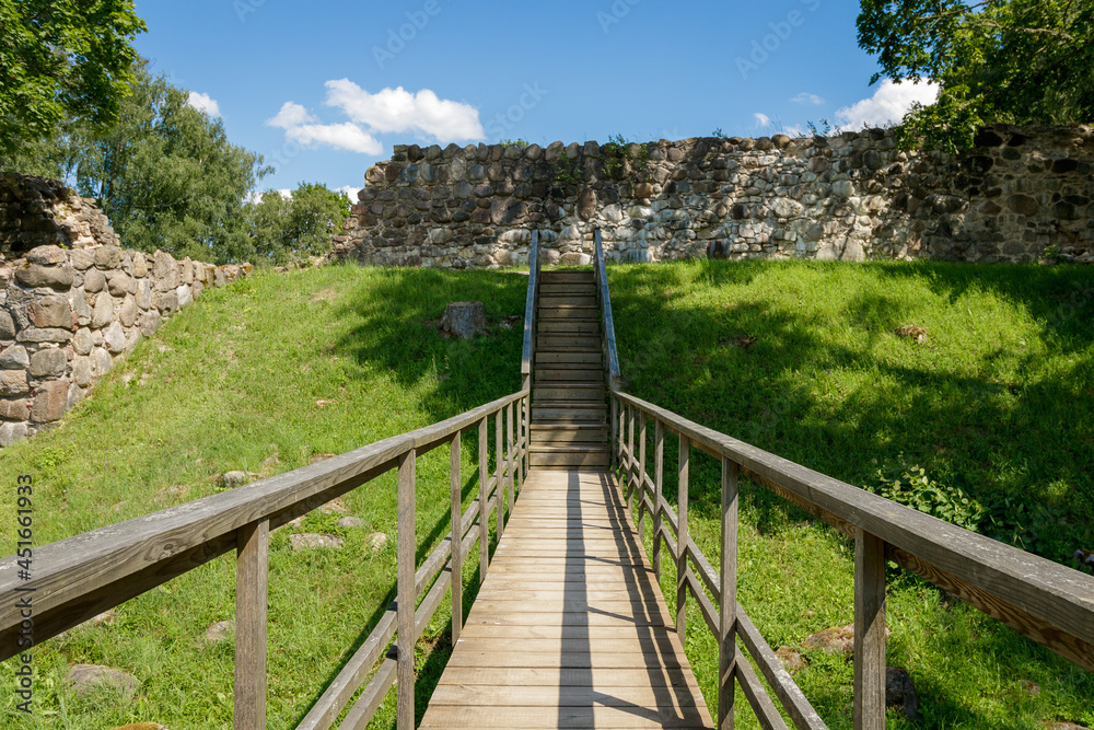 An old wooden bridge with a staircase