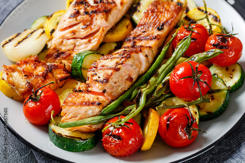grilled salmon and vegetables on a plate