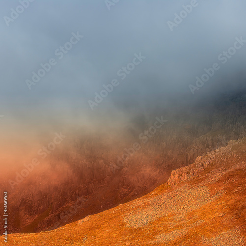 When sunlight meets the clouds.Abstract mountain landscape scenery in English Lake District.
