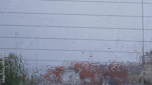 raindrops on car window perfect for meditational or nature video good for looping photo