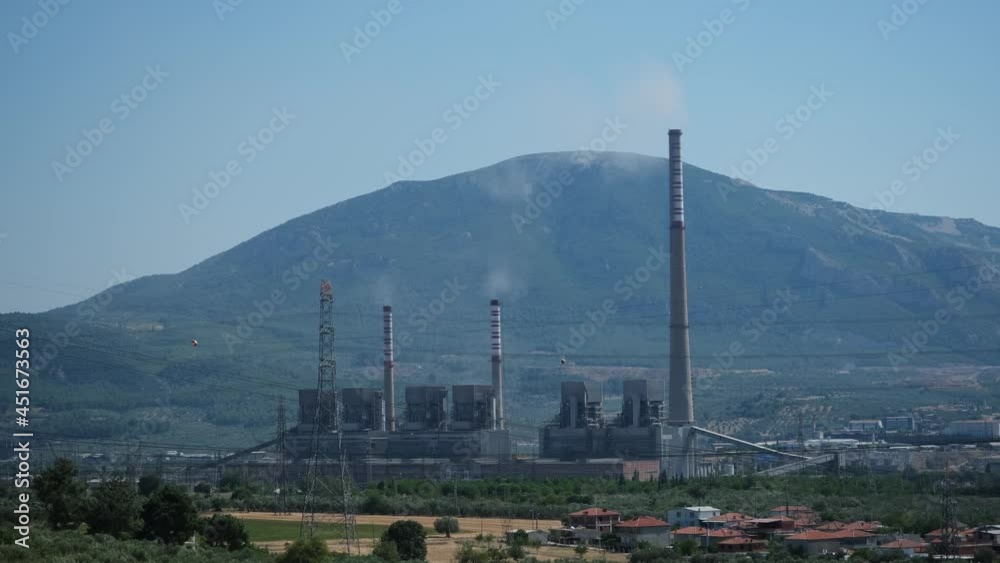 Coal power plant high pipes with black smoke moving up polluting atmosphere. Energy concept. Coal power plant high pipes with black smoke moving up polluting atmosphere. Energy concept.