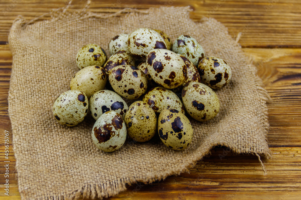 Quail eggs on a wooden table Quail eggs on a wooden table