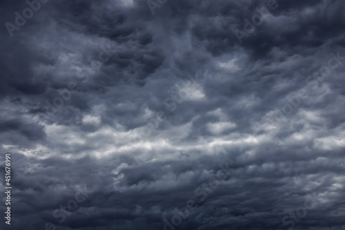 Stormy clouds. Moody dark cloudscape background before thunder storm. Natural sky view.