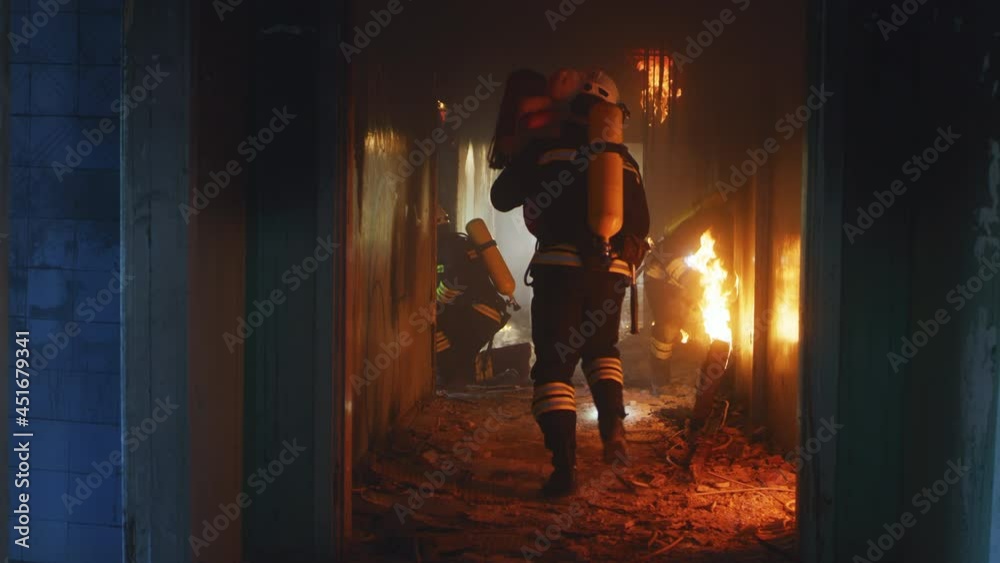 Firemen saving child during rescue operation