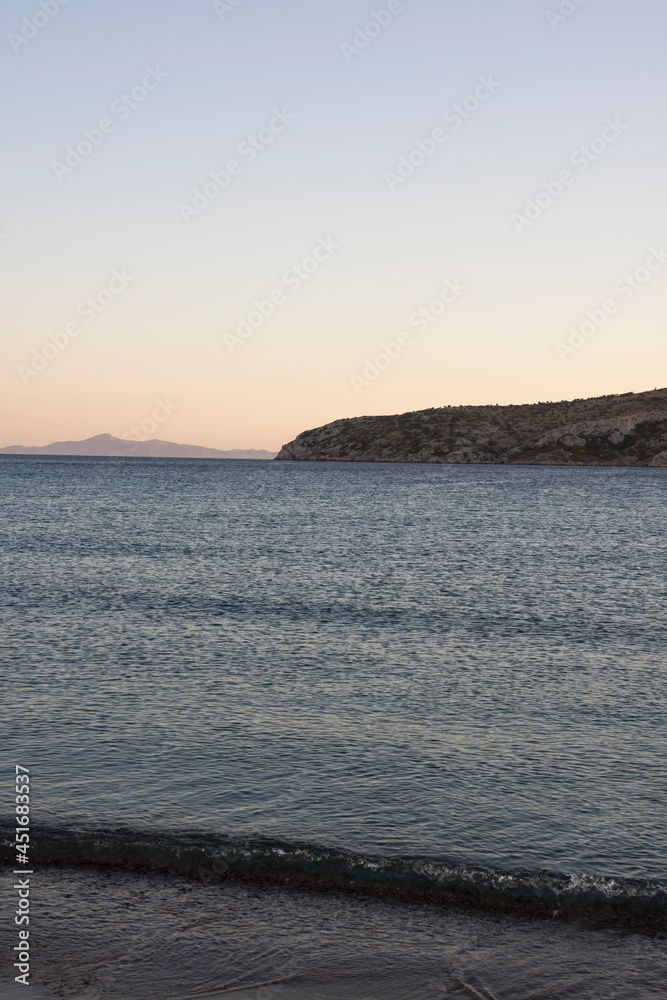 Charakas beach at sunset in attica in greece Charakas beach at sunset in attica in greece