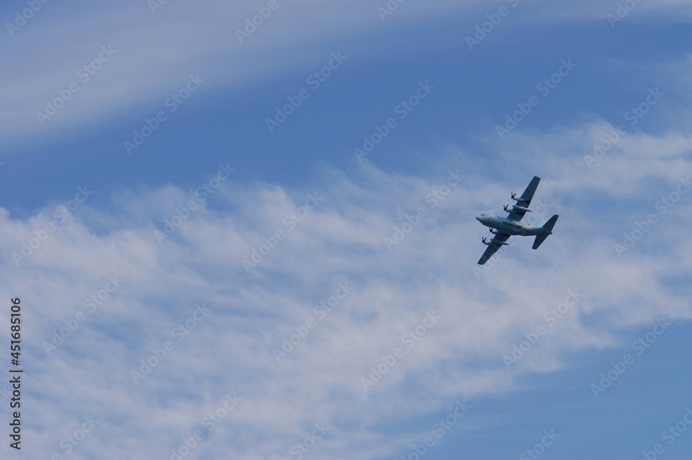 Aircraft flying against background of autumn blue sky Aircraft flying against background of autumn blue sky