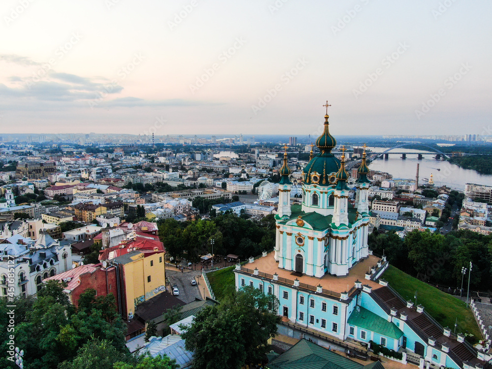 Aerial top view of Saint Andrew's church and Andreevska street, cityscape of Podol district.